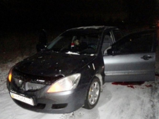 Под Киевом в машине мужчина застрелил девушку из-за СМС