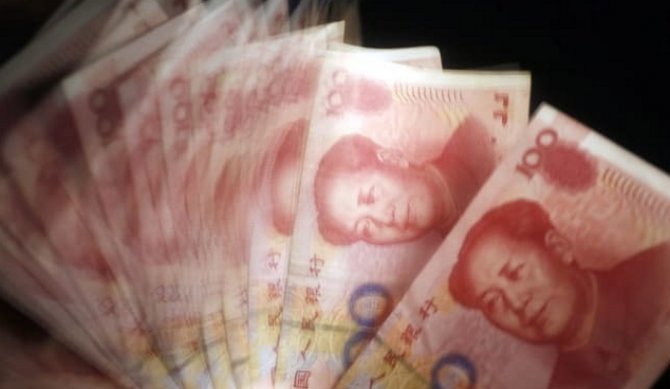 Центробанк Китая значительно снизил курс юаня