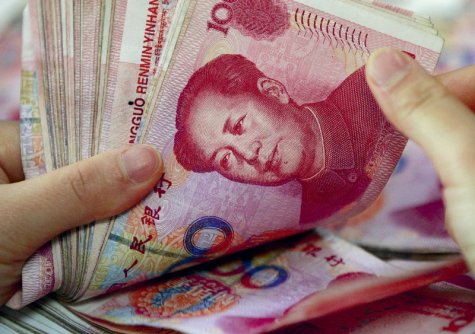 Китай понизил курс юаня до минимума