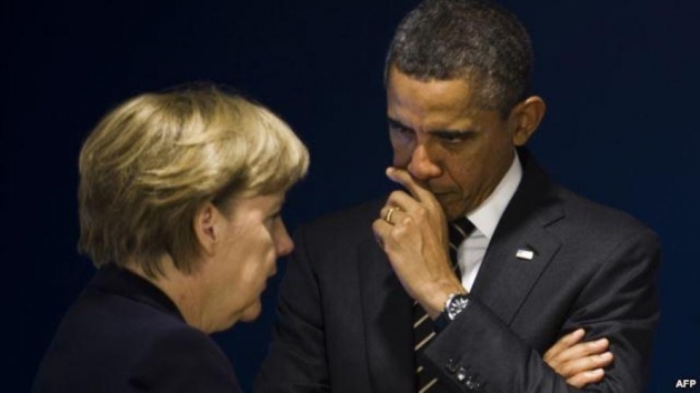 Обама и Меркель призвали выполнять соглашение о прекращении огня на Донбассе