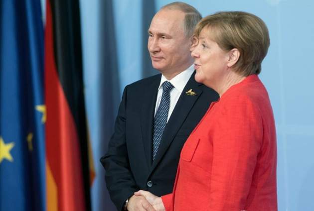 Путин едет в Германию: обсудит с Меркель Украину