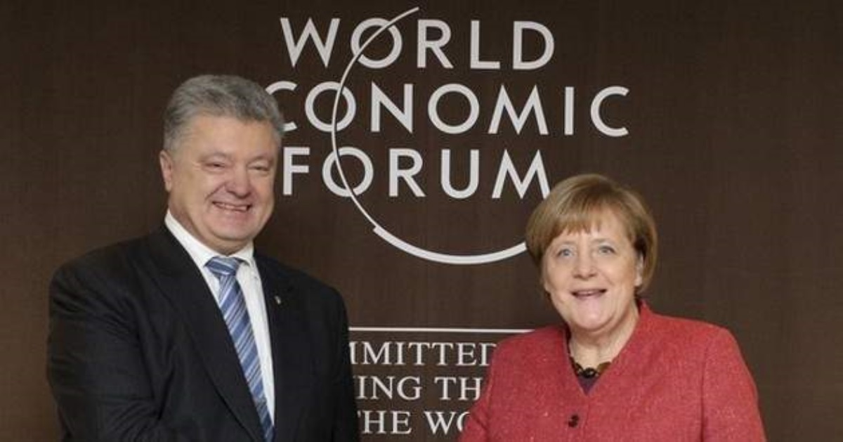 Про выборы и Донбасс: Порошенко поговорил с Меркель в Давосе