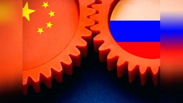 Водка за юани: Россию отрезвили последствиями "кошмара США"