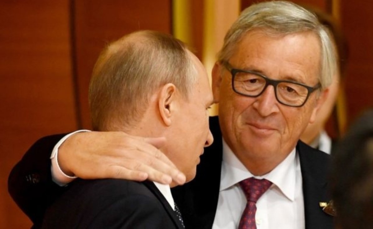 Зачем Юнкер поцеловал Путина