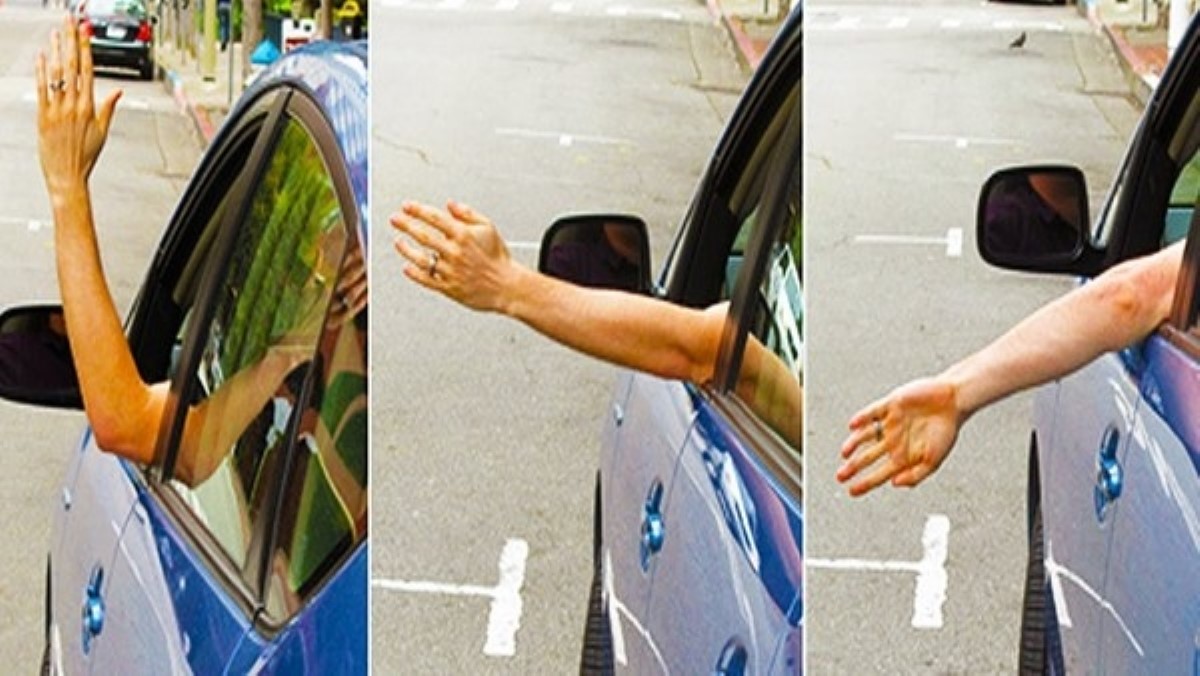 Попутный водитель показывает кукиш или взмахивает рукой и резко указывает на обочину: что означают жесты