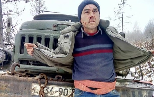 На Львовщине лесорубы избили и привязали к грузовику активиста