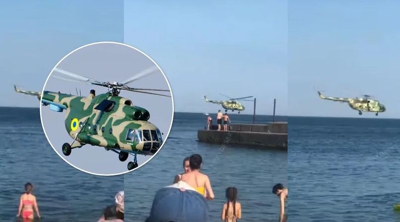 Прямо над головами: в Одессе военный вертолет пролетел над пляжниками