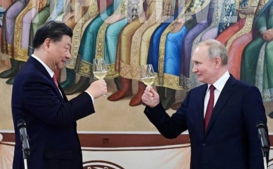 "Он меня называет своим другом", Путин летит к Си Цзиньпину